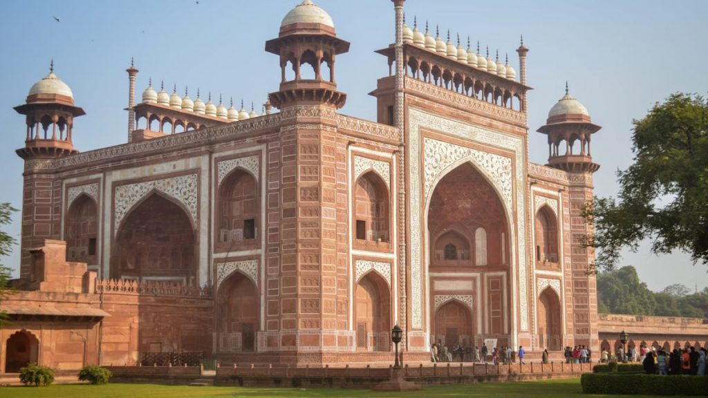 The grand entrance gateway of the Taj Mahal in Agra, showcasing exquisite Islamic architecture.